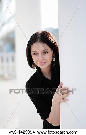 Picture - beautiful brunette outdoor portrait. Fotosearch