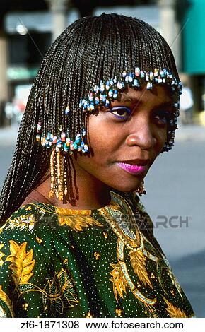 Beautiful Cameroon Africa woman in native costume with head dress and colorful costume in green gown View Large Photo Image Stock Photo - Beautiful Cameroon Africa woman in native costume with head dress and colorful costume in green gown. Fotosearch