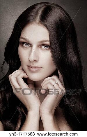 Beautiful caucasian woman with long brown hair View Large Photo Image Stock Image - Beautiful caucasian woman with long brown hair. Fotosearch
