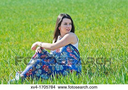Beautiful girl enjoy in the meadow View Large Photo Image Picture - Beautiful girl enjoy in the meadow. Fotosearch
