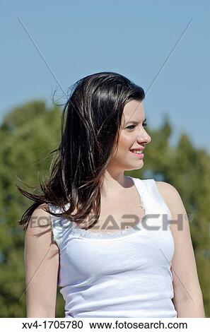 Beautiful girl enjoy in the meadow View Large Photo Image Stock Image - Beautiful girl enjoy in the meadow. Fotosearch