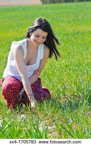 Beautiful girl enjoy in the meadow View Large Photo Image Stock Image - Beautiful girl enjoy in the meadow. Fotosearch