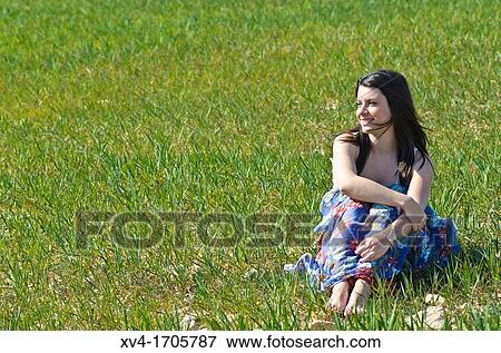 Beautiful girl enjoy in the meadow View Large Photo Image Stock Photo - Beautiful girl enjoy in the meadow. Fotosearch