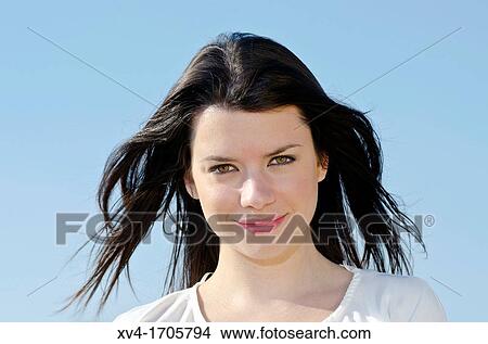 Beautiful girl looking at camera in countryside View Large Photo Image Picture - Beautiful girl looking at camera in countryside. Fotosearch