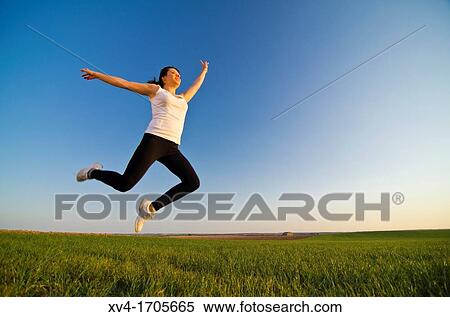 Beautiful girl make sport in countryside View Large Photo Image Stock Photography - Beautiful girl make sport in countryside. Fotosearch