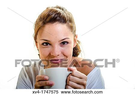 Beautiful girl take a coffee cup breakfast on the bed in the morning View Large Photo Image Stock Photography - Beautiful girl take a coffee cup breakfast on the bed in the morning. Fotosearch