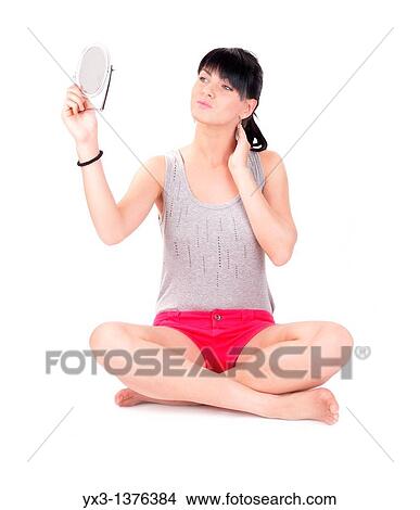 Picture - Beautiful girl with a mirror. Fotosearch