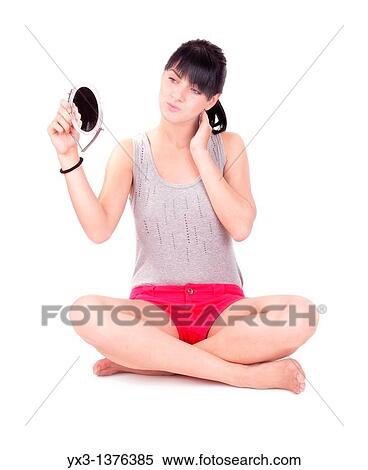 Stock Photography - Beautiful girl with a mirror. Fotosearch
