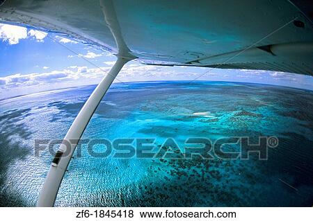 Beautiful Great Barrier Reef from plane near Cairns Queensland Australia View Large Photo Image Stock Photo - Beautiful Great Barrier Reef from plane near Cairns Queensland Australia. Fotosearch