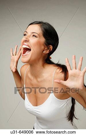 Beautiful Latin woman screams View Large Photo Image Stock Photograph - Beautiful Latin woman screams. Fotosearch