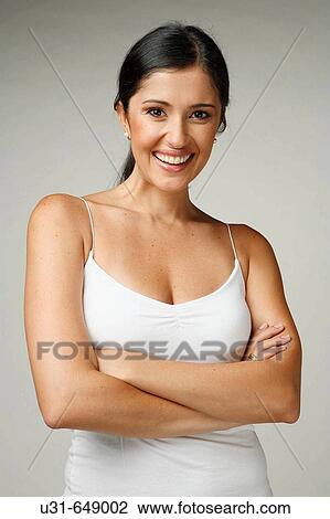 Beautiful Latin woman smiles at the camera View Large Photo Image Stock Image - Beautiful Latin woman smiles at the camera. Fotosearch