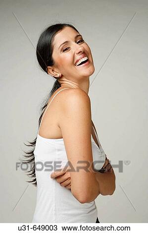 Beautiful Latin woman smiles at the camera View Large Photo Image Stock Image - Beautiful Latin woman smiles at the camera. Fotosearch