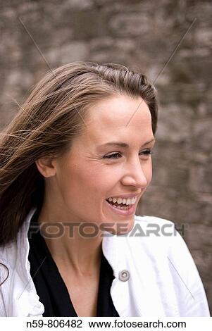 Beautiful natural looking brunette woman laughing View Large Photo Image Stock Image - Beautiful natural looking brunette woman laughing. Fotosearch