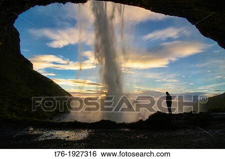 Beautiful Seljalandfoss waterfall lit up at sunset, southern Iceland View Large Photo Image Stock Photograph - Beautiful Seljalandfoss waterfall lit up at sunset, southern Iceland. Fotosearch