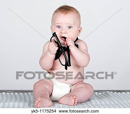 Beautiful Shot of a 5 Month Old Baby Boy in Bow Tie against Grey Background View Large Photo Image Picture - Beautiful Shot of a 5 Month Old Baby Boy in Bow Tie against Grey Background. Fotosearch
