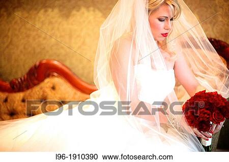 beautiful vintage bride sitting, waiting and contemplating her future before her wedding View Large Photo Image Stock Image - beautiful vintage bride sitting, waiting and contemplating her future before her wedding. Fotosearch