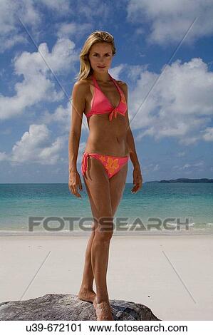 Beautiful woman in bikini standing on Whitehaven Beach, Australia. View Large Photo Image Stock Image - Beautiful woman in bikini standing on Whitehaven Beach, Australia.. Fotosearch