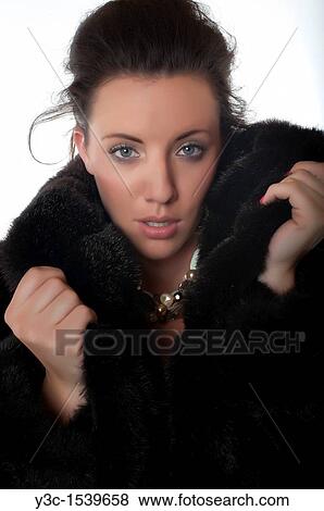 Beautiful woman in fur coat View Large Photo Image Stock Photo - Beautiful woman in fur coat. Fotosearch