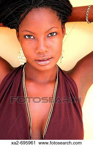 Beautiful woman with hands in hair View Large Photo Image Stock Image - Beautiful woman with hands in hair. Fotosearch