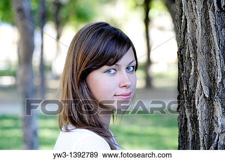 Beautiful woman with in the summer park View Large Photo Image Stock Photo - Beautiful woman with in the summer park. Fotosearch