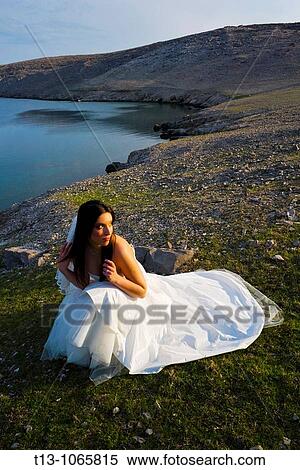Beautiful young bride in sunset light View Large Photo Image Stock Photography - Beautiful young bride in sunset light. Fotosearch