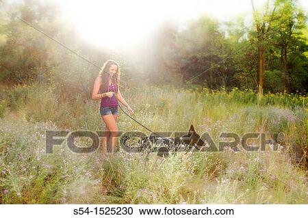 Beautiful young caucasian woman with her German Shepherd dog in Spokane, Washington, USA View Large Photo Image Stock Image - Beautiful young caucasian woman with her German Shepherd dog in Spokane, Washington, USA. Fotosearch