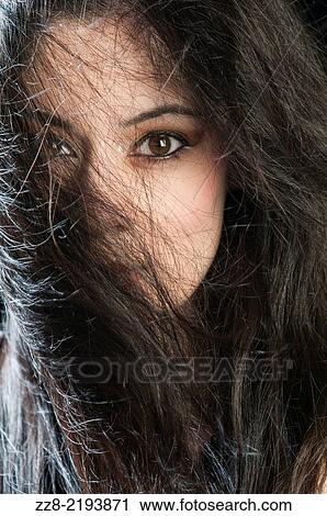 Beautiful young woman hair covering face. View Large Photo Image Stock Image - Beautiful young woman hair covering face.. Fotosearch