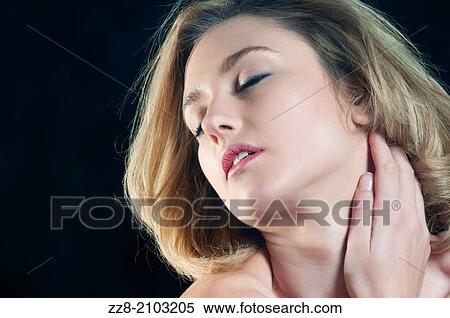 Beautiful young woman hand touching neck. View Large Photo Image Stock Photography - Beautiful young woman hand touching neck.. Fotosearch
