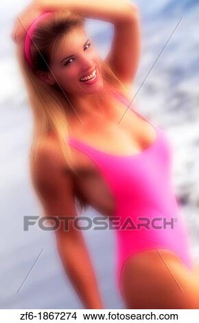 Beautiful young woman walking on the beach View Large Photo Image Picture - Beautiful young woman walking on the beach. Fotosearch