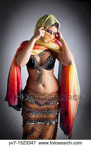 Beautifull belly dancer with veil View Large Photo Image Stock Photo - Beautifull belly dancer with veil. Fotosearch