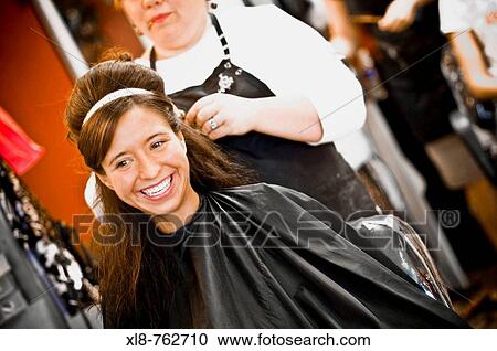 Stock Image - Beauty Care, Wedding day, Bride, hair salon. Fotosearch