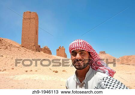 Bedouin near Tower tomb at Palmyra, Syria. View Large Photo Image Stock Image - Bedouin near Tower tomb at Palmyra, Syria.. Fotosearch