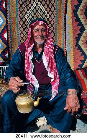 Bedouin with teapot. Syria View Large Photo Image Stock Image - Bedouin with teapot. Syria. Fotosearch