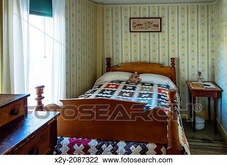 Stock Image - Bedroom birthplace of President Calvin Coolidge, Plymouth Notch, Vermont, USA.. Fotosearch