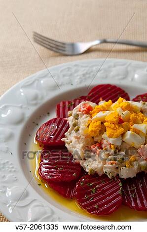 Beetroot with ensaladilla rusa. Close view. View Large Photo Image Stock Photography - Beetroot with ensaladilla rusa. Close view.. Fotosearch