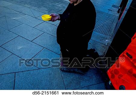 Beggar in a corner, Valencia, Spain View Large Photo Image Stock Image - Beggar in a corner, Valencia, Spain. Fotosearch