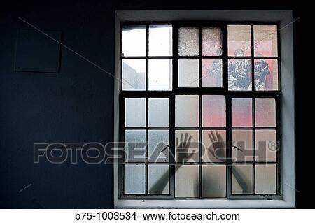 Behind the window View Large Photo Image Picture - Behind the window. Fotosearch