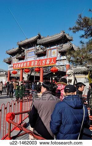 Stock Image - Beijing (China): never ending queue in front of the White Cloud Temple during the Lunar New Year period (Spring Festival). Fotosearch