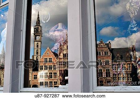 Stock Photo - Belgium, Flanders, Ghent, Reflection in Windows Shop. Fotosearch