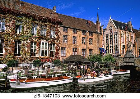 Belgium Houses and boats on Canals of beautiful Bruges Belgium View Large Photo Image Stock Image - Belgium Houses and boats on Canals of beautiful Bruges Belgium. Fotosearch