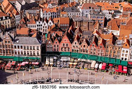 Belgium Market Place in center cafes taken from Belfort 337 steps above center in the colorful city of Bruges View Large Photo Image Stock Photograph - Belgium Market Place in center cafes taken from Belfort 337 steps above center in the colorful city of Bruges. Fotosearch