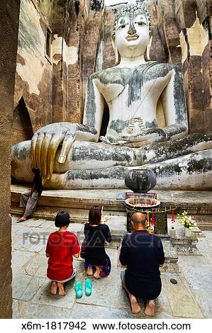 Believers in a Buddha statue Wat Sri Chum Sukhothai Historical Park Thailand View Large Photo Image Stock Image - Believers in a Buddha statue Wat Sri Chum Sukhothai Historical Park Thailand. Fotosearch