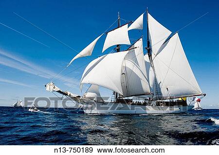 Stock Photo - ? Belle-Poule? French naval schooner cruising to Douarnenez, International Maritime Festival, Brest, Finistere, Bretagne, France (11- 17 July 2008). Fotosearch