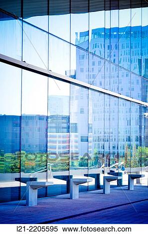 Benches. Buildings reflected in the glass. @22 district, Barcelona, Catalonia, Spain. View Large Photo Image Stock Photography - Benches. Buildings reflected in the glass. @22 district, Barcelona, Catalonia, Spain.. Fotosearch