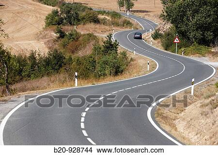Bending road near Salinas de Aana, Alava, Basque Country, Spain View Large Photo Image Picture - Bending road near Salinas de Aana, Alava, Basque Country, Spain. Fotosearch