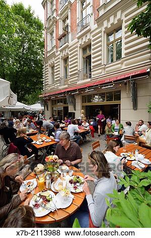 Berlin. Germany. Brunch at Caf? Anna Blume on Kollwitzstrasse, Prenzlauer Berg. View Large Photo Image Stock Photo - Berlin. Germany. Brunch at Caf? Anna Blume on Kollwitzstrasse, Prenzlauer Berg.. Fotosearch