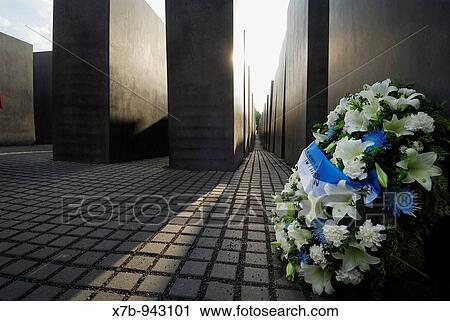 Berlin Germany Memorial to the Murdered Jews of Europe aka Holocaust Memorial designed by architect Peter Eisenman & engineer Buro Happold View Large Photo Image Stock Image - Berlin Germany Memorial to the Murdered Jews of Europe aka Holocaust Memorial designed by architect Peter Eisenman & engineer Buro Happold. Fotosearch