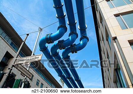Berlin's famous aerial pipes transporting the water pumped out of construction sites. As Berlin sits on a swampy area, construction foundations are often flooded. Berlin, Germany, Europe. View Large Photo Image Stock Image - Berlin's famous aerial pipes transporting the water pumped out of construction sites. As Berlin sits on a swampy area, construction foundations are often flooded. Berlin, Germany, Europe.. Fotosearch
