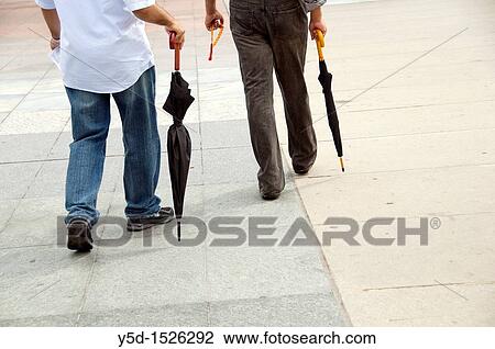 better to be prepared, two men walking with closed umbrellas, streetlife View Large Photo Image Stock Image - better to be prepared, two men walking with closed umbrellas, streetlife. Fotosearch
