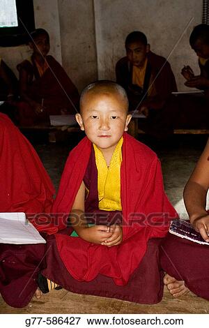 Bhutan. Buthang Valley. Karchu Dratsang Monastery. Little Buddhist Monk. View Large Photo Image Stock Photo - Bhutan. Buthang Valley. Karchu Dratsang Monastery. Little Buddhist Monk.. Fotosearch